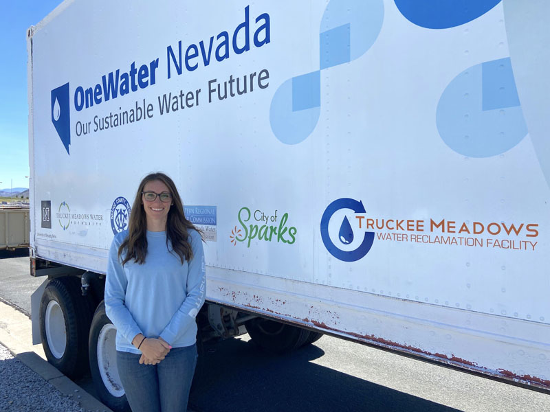 Lydia Teel, the emerging resources program administrator at Truckee Meadows Water Authority, stands in front of one of the semi-trailers she and other project leaders used as a treatment lab on June 21, 2023, in Reno, Nev. Credit: Kaleb Roedel, Mountain West News Bureau